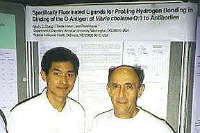Photo of Alex and Paul presenting their poster at 10th Eurocarb 