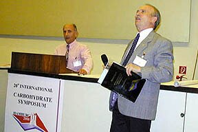Photo of Dr. A. Liptak introducing Paul's presentation at the 20th International Carbohydrate Symposium